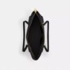 Station-veske i signaturlær