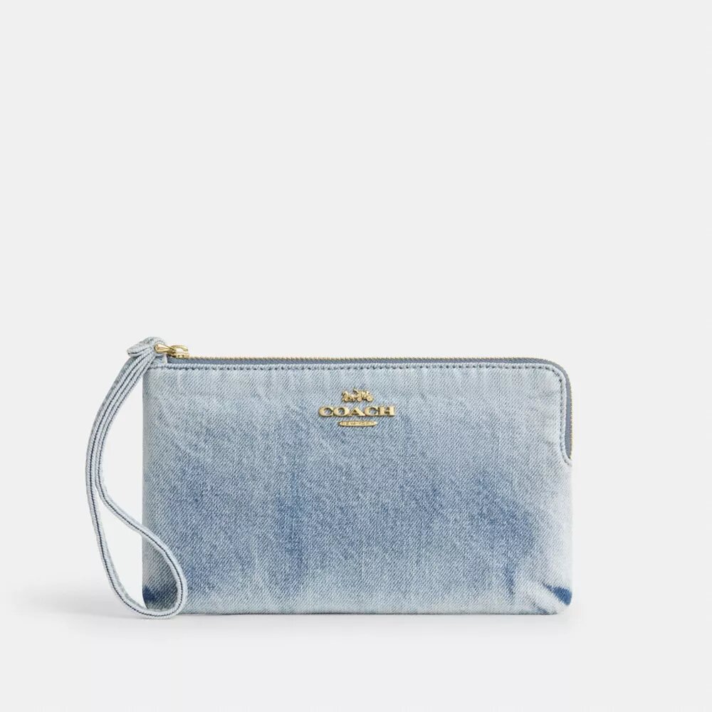 Stor håndleddsveske med glidelås i hjørnet i «Loved Denim»