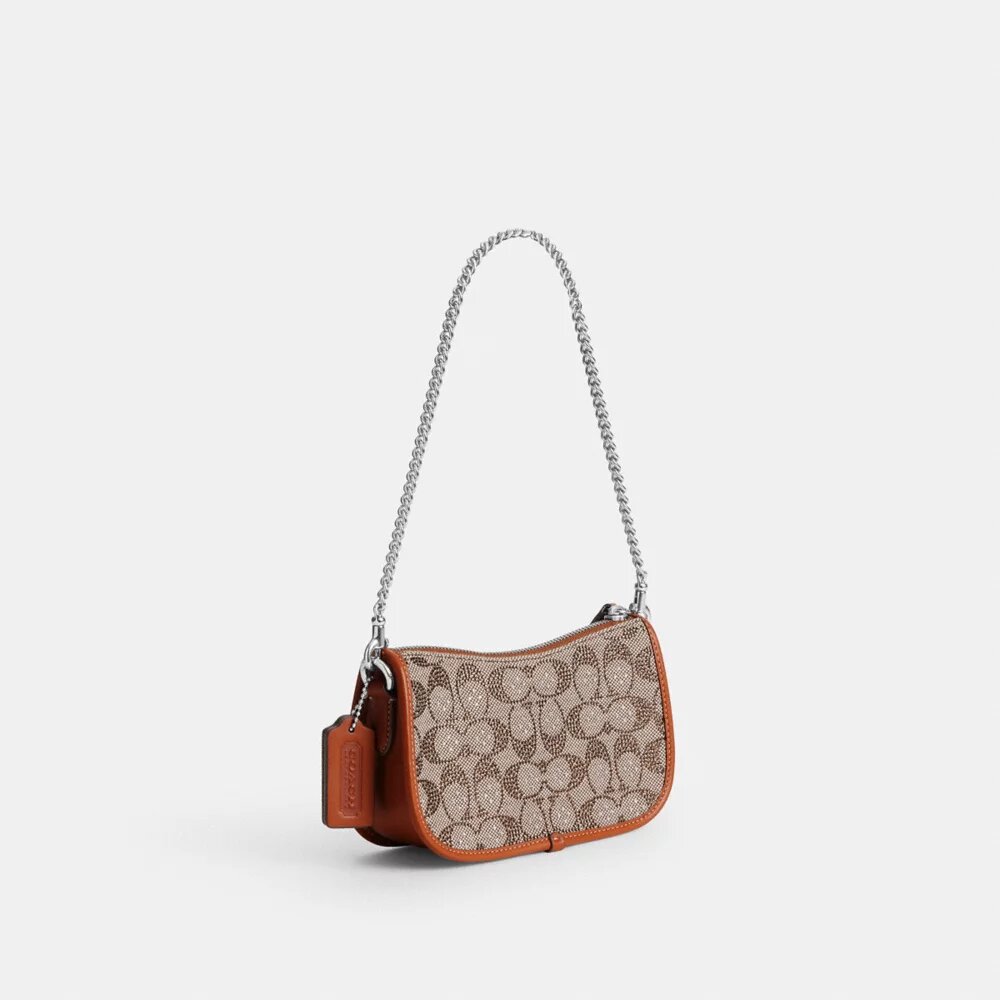 Swinger-vesker 20 med kjede i Crystal Signature-jacquard