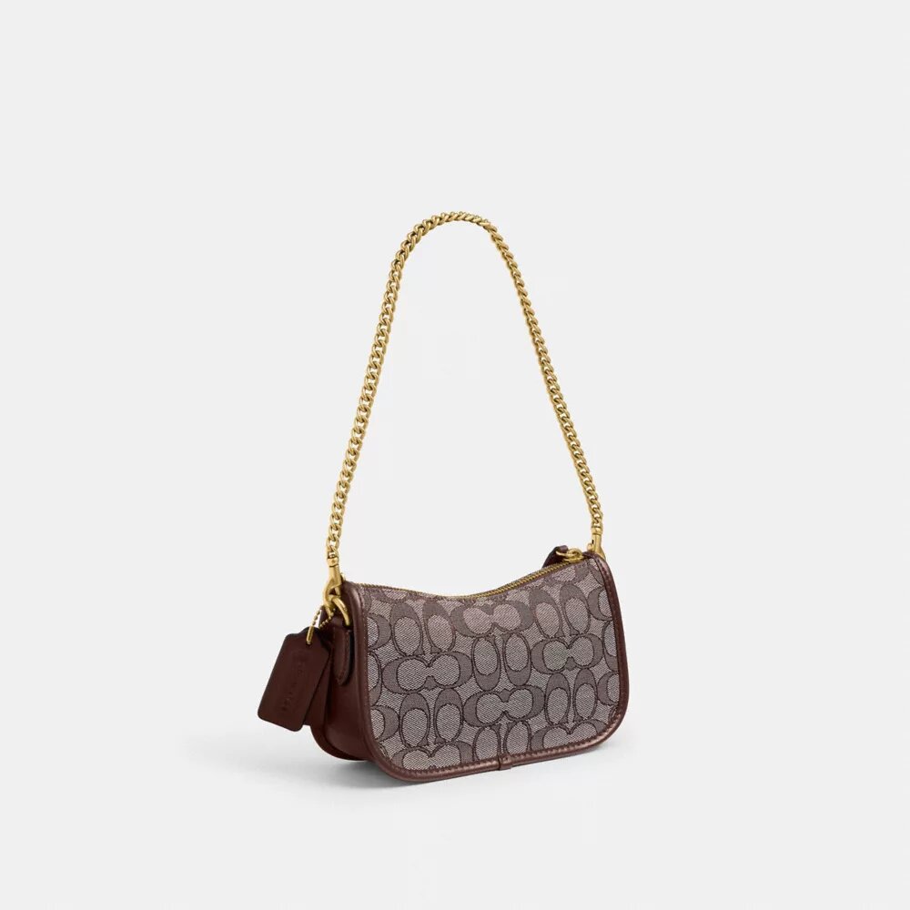 Swinger-vesker 20 med kjede i signaturjacquard