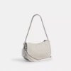 Swinger-vesker i signatur-jacquard
