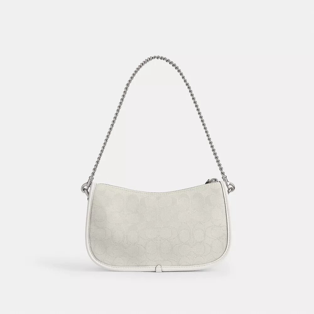 Swinger-vesker i signatur-jacquard