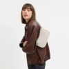 Swinger-vesker i signatur-jacquard