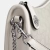 Swinger-vesker i signatur-jacquard