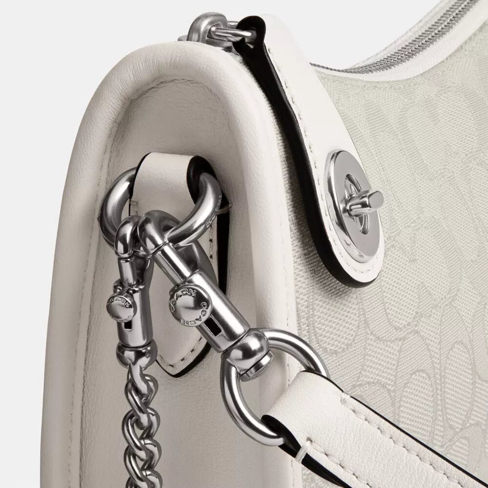 Swinger-vesker i signatur-jacquard
