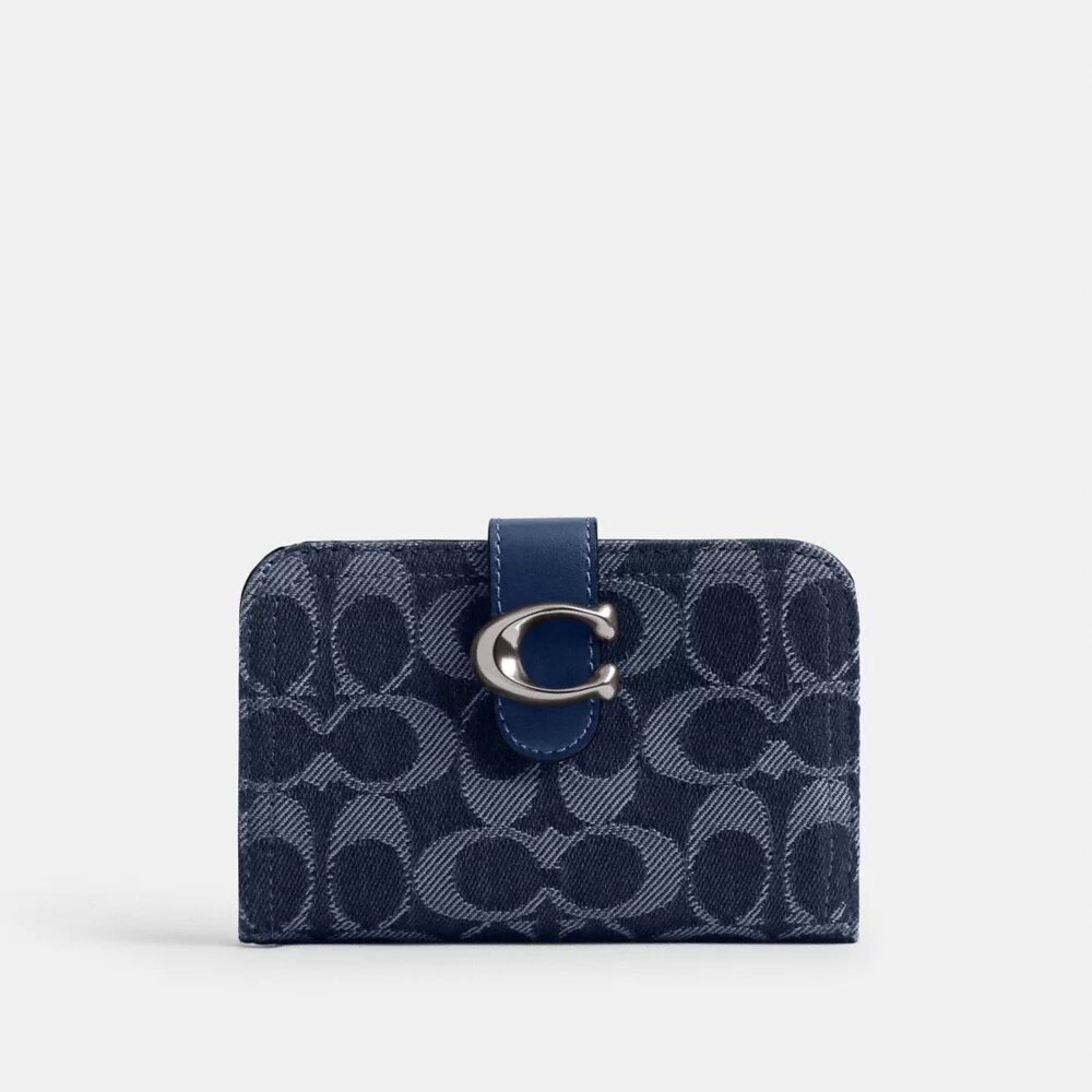 Tabby-lommebok i karakteristisk denim
