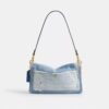 Tabby skulderveske 26 med patchwork av gjenbrukt denim