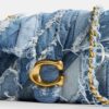 Tabby skulderveske 26 med quiltet patchwork av gjenbrukt denim