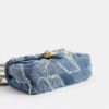 Tabby skulderveske 26 med quiltet patchwork av gjenbrukt denim