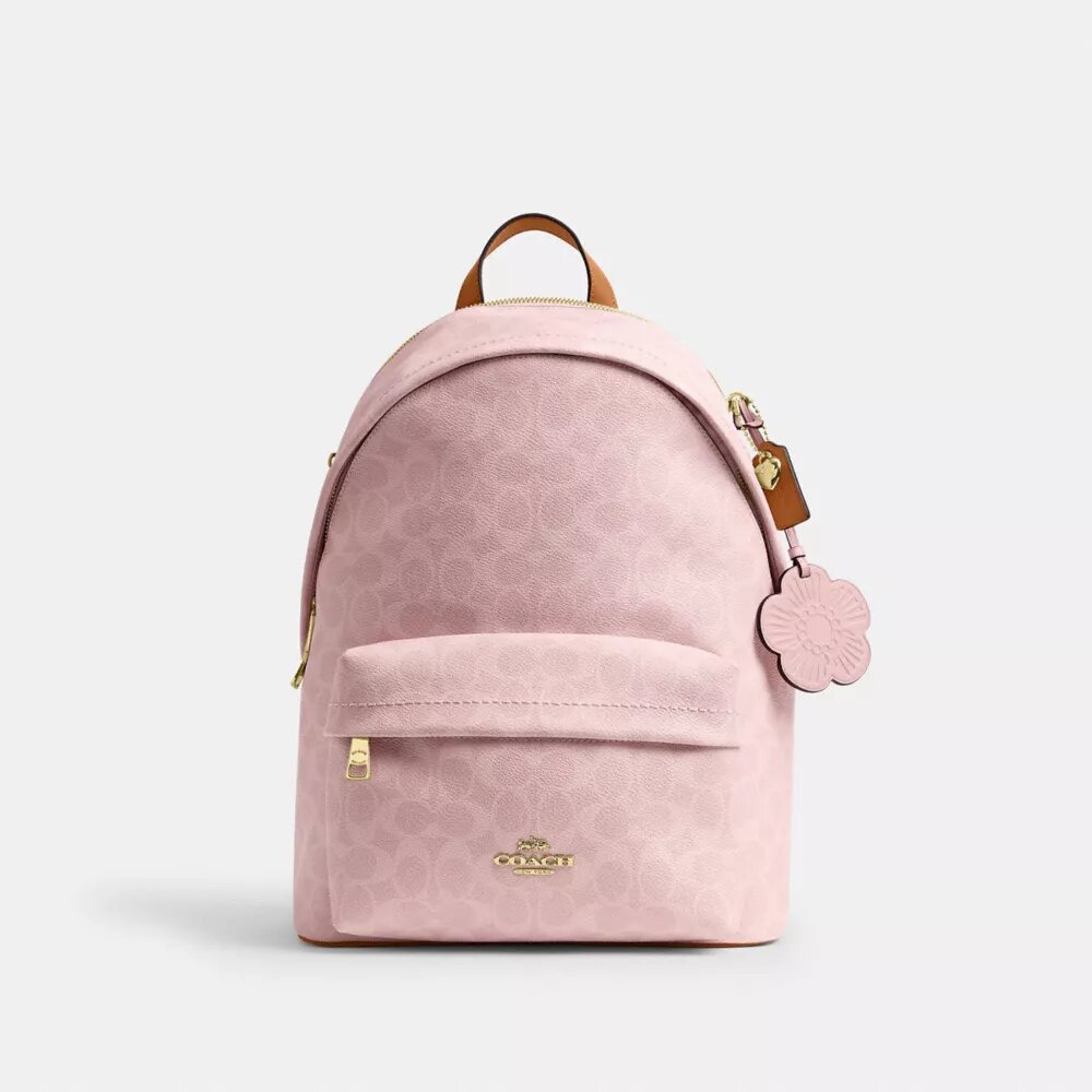 Taylor liten ryggsekk i Signature Canvas med anheng