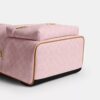 Taylor liten ryggsekk i Signature Canvas med anheng