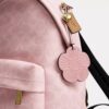 Taylor liten ryggsekk i Signature Canvas med anheng