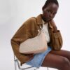 Teri Hobo-veske i Signature Canvas
