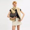 Teri Hobo-veske i Signature Canvas