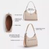Teri Hobo-veske i Signature Canvas