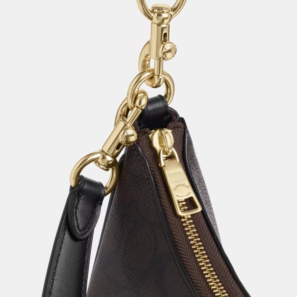 Teri Hobo-veske i Signature Canvas
