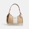 Teri Hobo-veske i Signature Canvas med striper