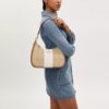 Teri Hobo-veske i Signature Canvas med striper