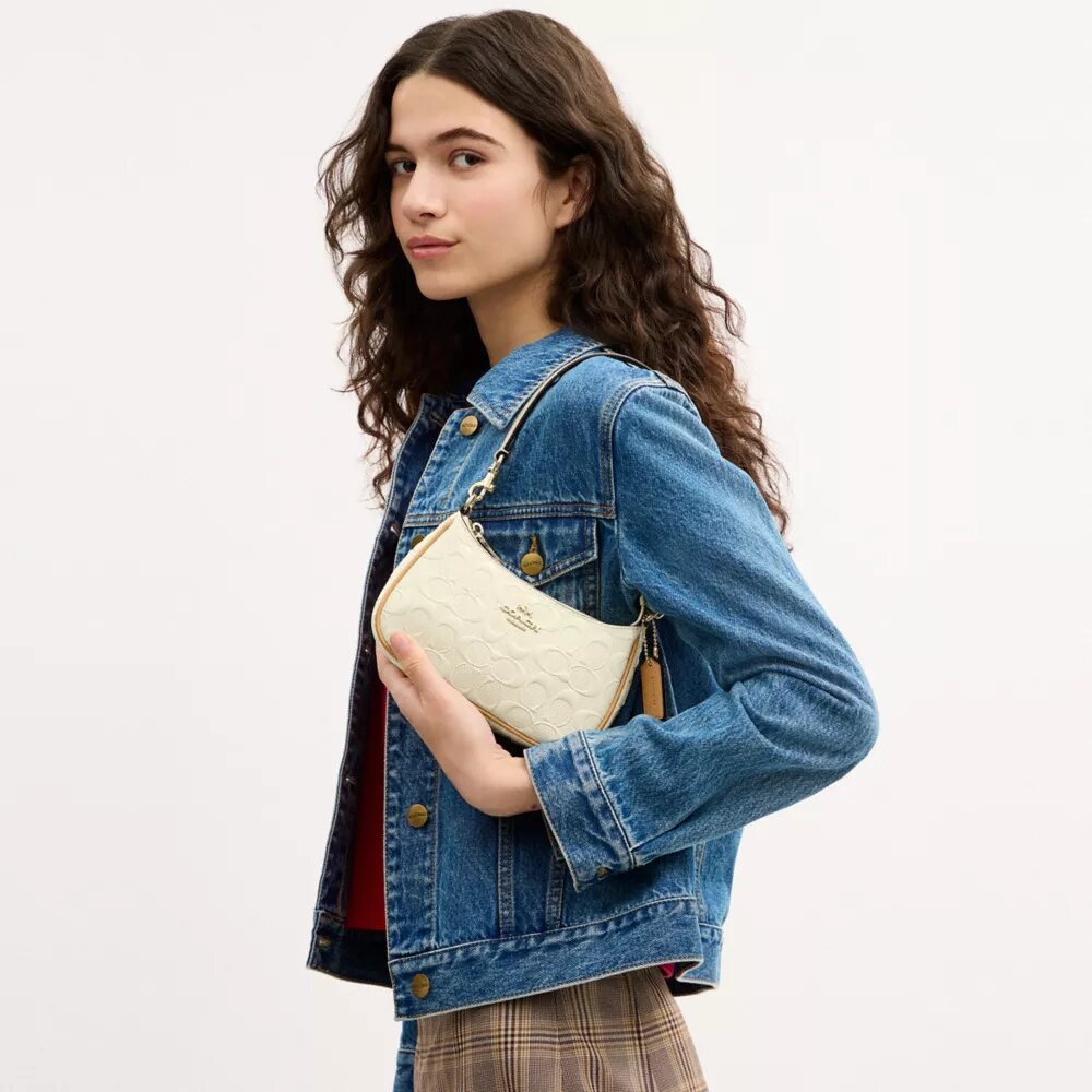Teri Mini-crossbody-veske i signaturlær