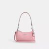 Teri Mini-crossbody-veske i signaturlær med hjerteanheng