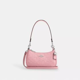 Teri Mini-crossbody-veske i signaturlær med hjerteanheng