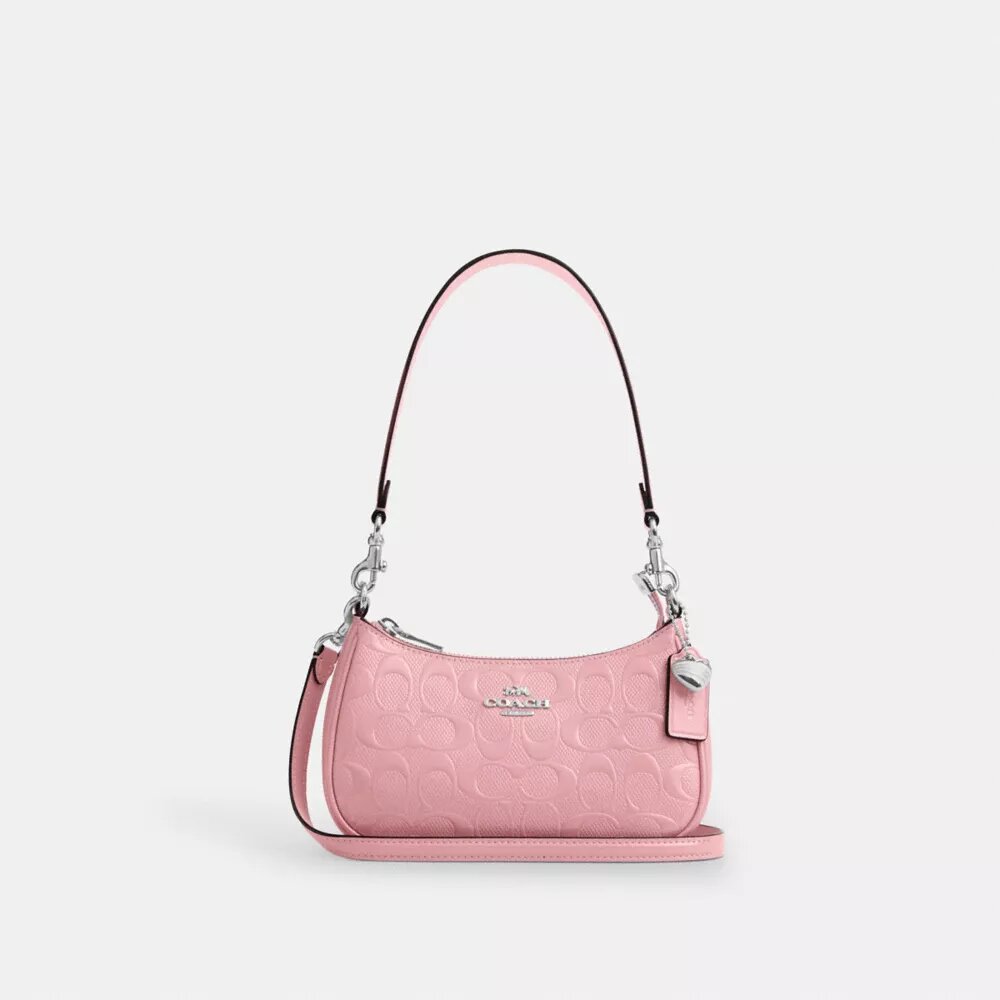 Teri Mini-crossbody-veske i signaturlær med hjerteanheng