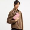 Teri Mini-crossbody-veske i signaturlær med hjerteanheng
