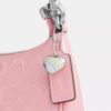Teri Mini-crossbody-veske i signaturlær med hjerteanheng