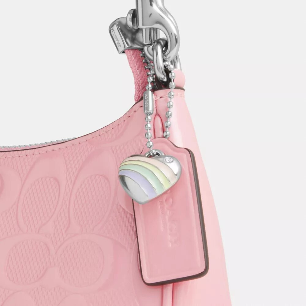 Teri Mini-crossbody-veske i signaturlær med hjerteanheng