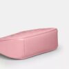 Teri Mini-crossbody-veske i signaturlær med hjerteanheng