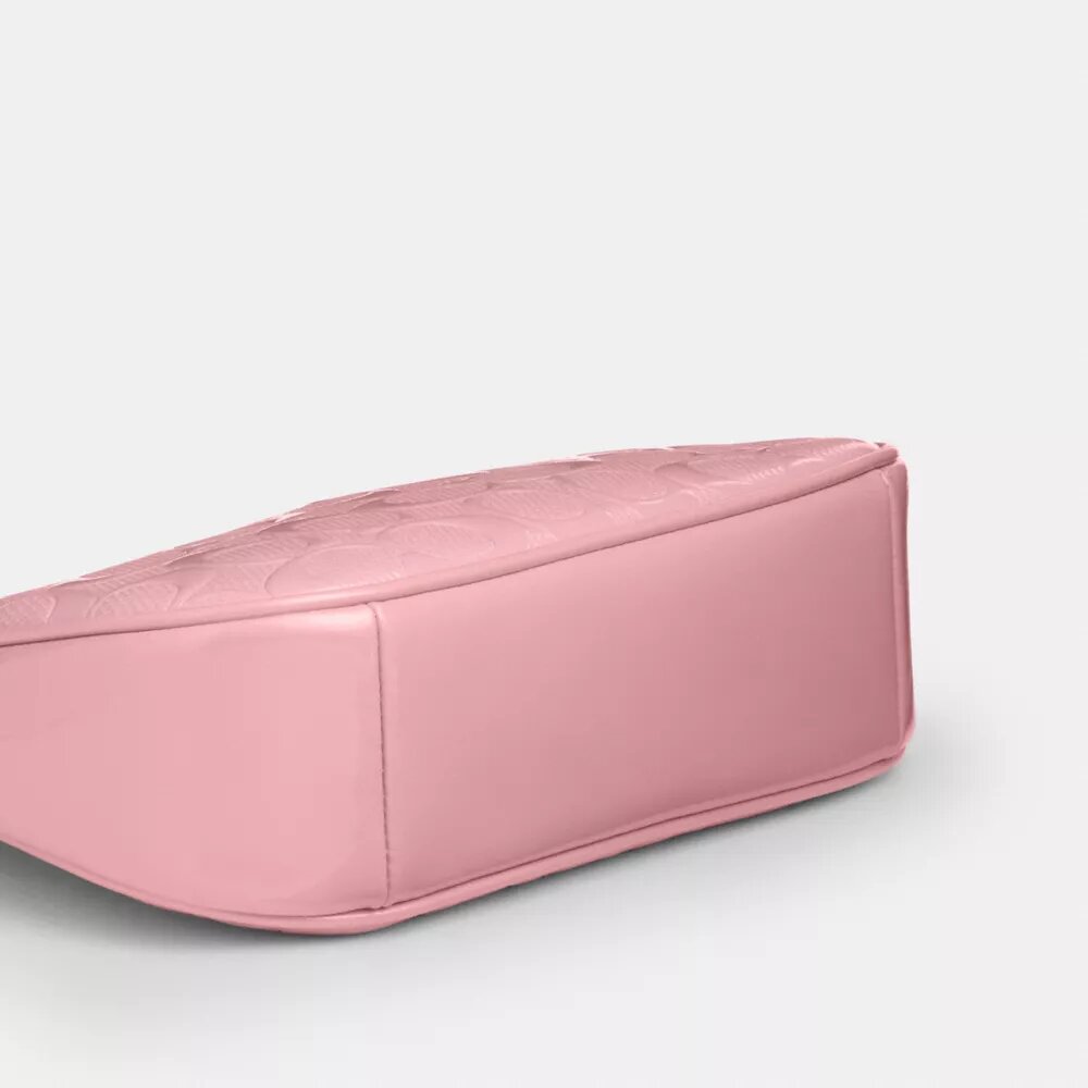 Teri Mini-crossbody-veske i signaturlær med hjerteanheng