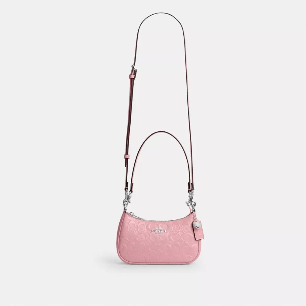 Teri Mini-crossbody-veske i signaturlær med hjerteanheng