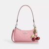 Teri Mini-crossbody-veske i signaturlær med hjerteanheng