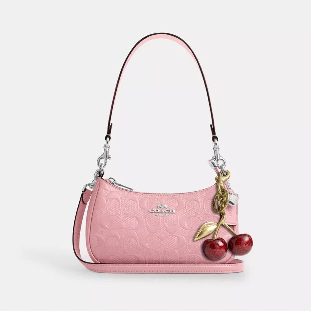 Teri Mini-crossbody-veske i signaturlær med hjerteanheng