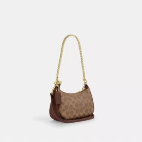 Teri Mini-veske med kryssrem i Signature Canvas