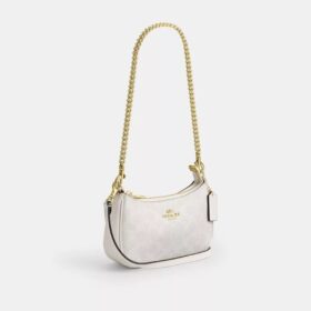 Teri Mini-veske med kryssrem i Signature Canvas
