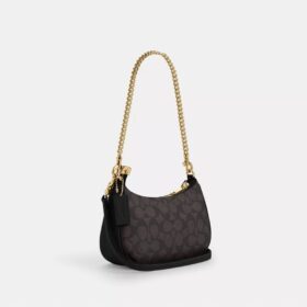 Teri Mini-veske med kryssrem i Signature Canvas