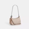 Teri Mini-veske med kryssrem i Signature Canvas