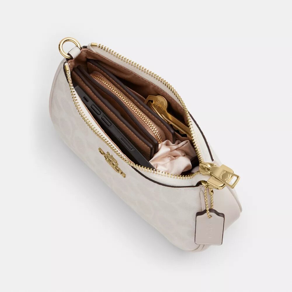 Teri Mini-veske med kryssrem i Signature Canvas