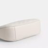 Teri Mini-veske med kryssrem i Signature Canvas