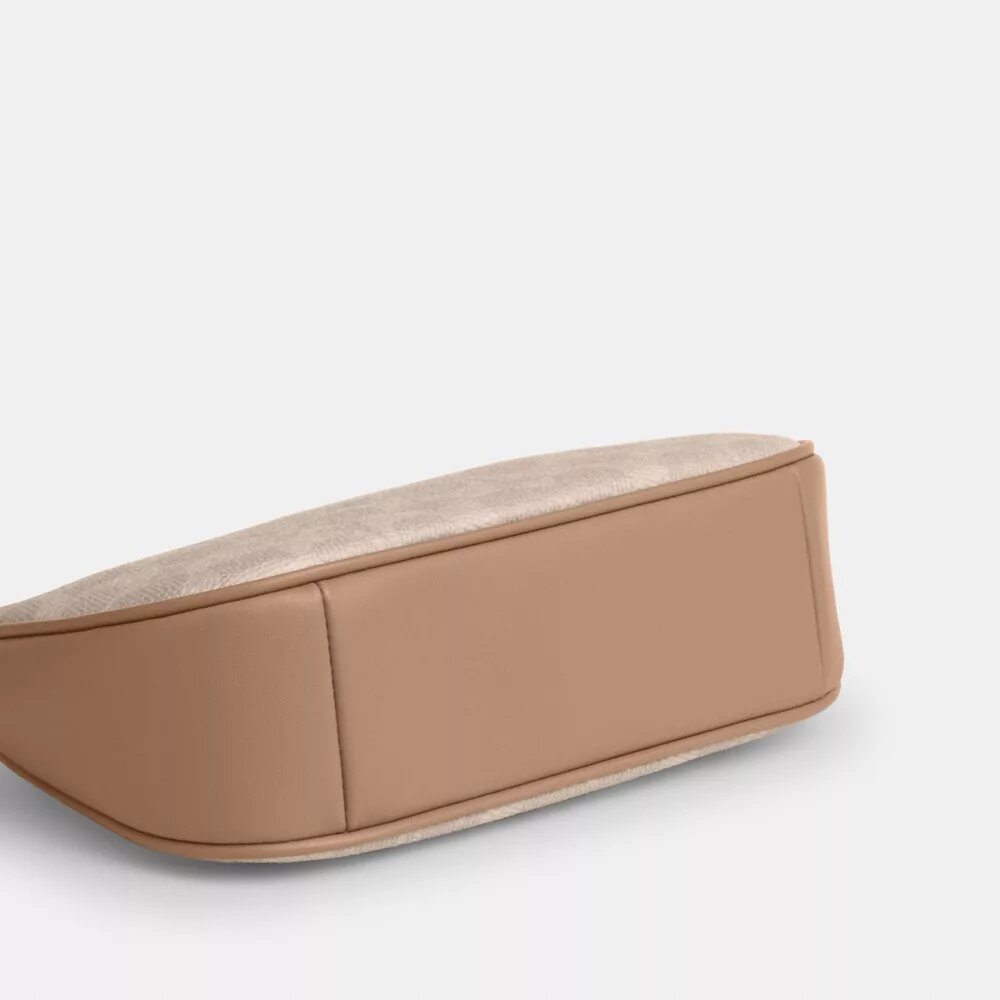 Teri Mini-veske med kryssrem i Signature Canvas