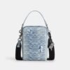 Tristan crossbody-veske 14 i «Loved» Signature-denim med anheng